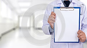 doctor holding a clipboard Hands of Health care medical backgro