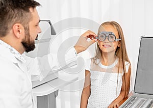 Doctor holding eye equipment