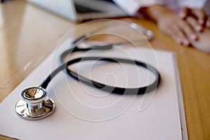 Doctor holding patient`s hand, and reassuring his male patient helping hand concept