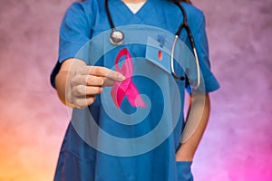 Doctor holding red ribbon. AIDS world day. Social advertising