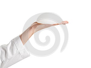 Doctor holding silicone implant for breast augmentation on white background