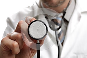 Doctor holding stethoscope