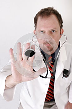 Doctor holding stethoscope