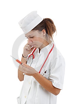 Doctor holding syringe