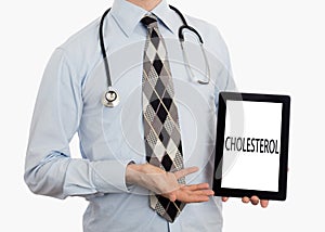 Doctor holding tablet - Cholesterol