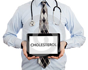 Doctor holding tablet - Cholesterol