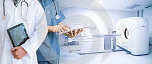 Doctor holding a tablet medical concept Computer X-ray CT scan in hospital