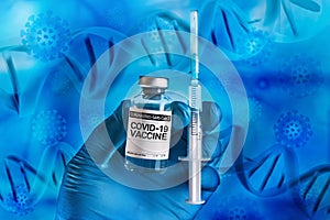 Doctor holding Vaccine vial and syringe with doses for Covid-19 and background dna and coronavirus illustration