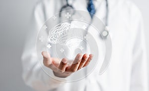 Doctor holding virtual human brain, idea creative intelligence thinking or Awareness