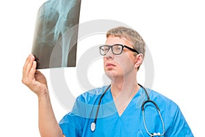 Doctor holding an x-ray pelvis isolated