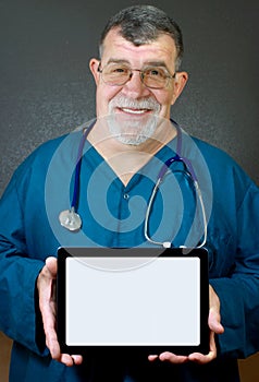 Doctor Holds a Computer Tablet with Blank Screen