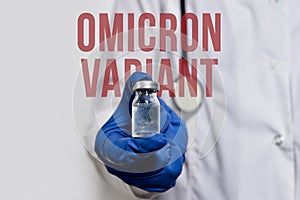 A doctor holds vaccine against new covid-19 omicron variant photo