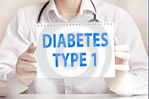 Doctor holds a white sheet of paper and points to the text diabetes type 1, medical concept