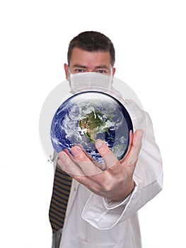 Doctor holds world globe featuring America