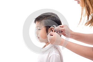 Doctor Inserting Hearing Aid