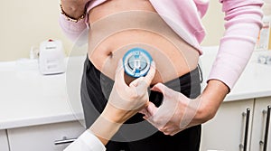 Doctor install patient insulin catheter for a simple injection of insulin.