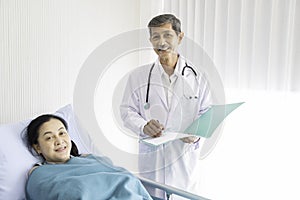 The doctor is introducing and encouraging patients