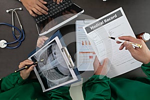 doctor joins a meeting with the surgeon's team to discuss a plan for cancer surgery after the medical team detects cancer.