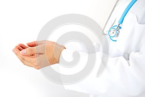 Doctor with lab coat and stethoscope holds hands in gesture of containing