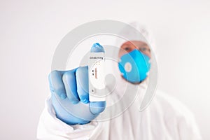 Doctor with laboratory COVID-19 test kit for diagnosis coronavirus infection