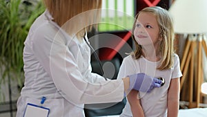 Doctor listening child breath with stethoscope, appointment with gp