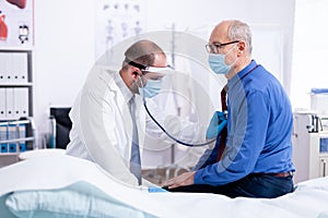 Doctor listening heart beat