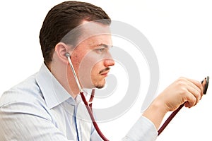 Doctor listening with a stethoscope