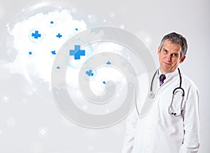 Doctor listening to abstract cloud with medical signs