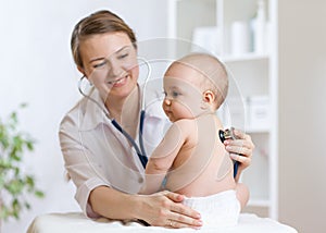 Doctor listens to baby heart with stethoscope