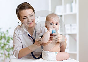 Doctor listens to baby heart with stethoscope
