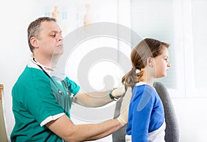 Doctor with little girl