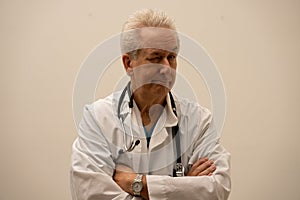 Doctor looking at camera with one eye shut