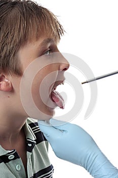 Doctor looking inside mouth