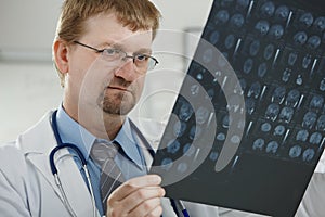 Doctor looking at medical scan