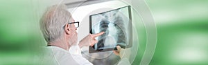 Doctor looking at x-ray