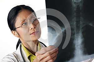 Doctor Looking at X-Ray