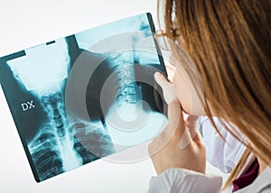 doctor looks at x-rays