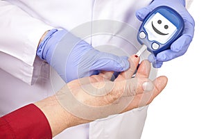 Doctor making blood sugar test. Smiley face