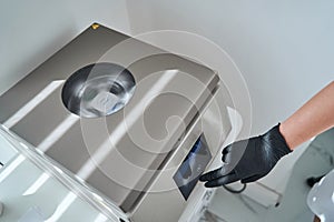 Doctor making a platelet-rich plasma serum using a laboratory equipment photo