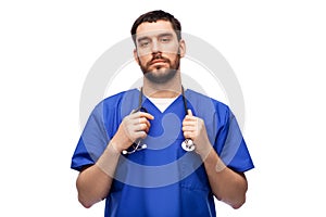 doctor or male nurse with stethoscope