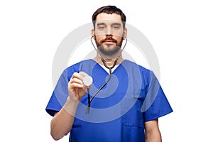 doctor or male nurse with stethoscope