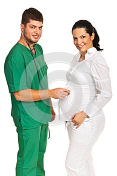Doctor man examine pregnant woman