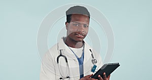 Doctor, man and tablet with smile, studio or face for telehealth, data analysis or review by blue background. African