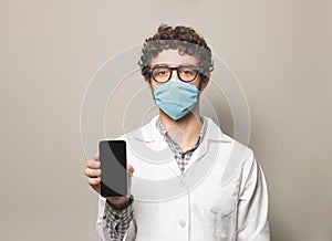 Doctor mask and cellphone