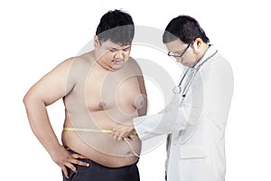 Doctor measuring a patient obesity 1