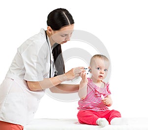 Doctor measuring temperature baby girl