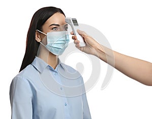 Doctor measuring woman`s temperature on white background, closeup. Prevent spreading of Covid-19