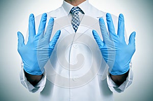 A doctor with medical gloves