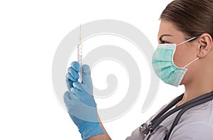 Doctor with medical injection syringe and stethoscope,