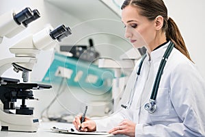 Doctor in the medical lab analyzing samples